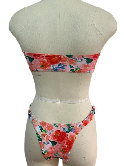 Floral print tube top bikini with blue and purple flowers, white lace trim, and a central ring detail. - Image 13