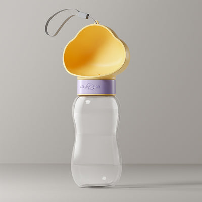 Yellow and clear portable pet water bottle with integrated drinking bowl and separate food container for walking dogs. - Image 10