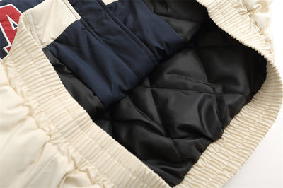 Chaqueta Acolchada de Algodón con Bordado de Letras y Contraste de Colores - Image 17
