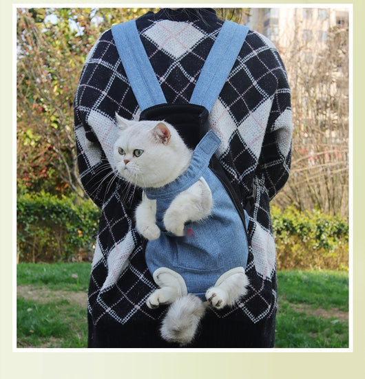 Denim blue pet carrier backpack with open head and leg holes, featuring breathable mesh and a front pocket. - Image 13
