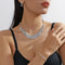 Conjunto de 4 Piezas: Collar, Pulsera, Aretes y Anillo con Diseño de Garra