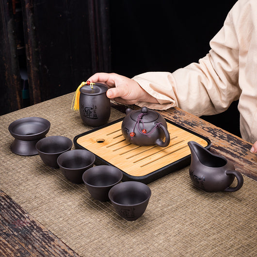 Juego de Té Portátil Zisha: Una Tetera y Cuatro Tazas