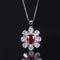 S925 Plateado Jewelry Set Imitated Pigeon Blood Rojo Treasure Flower-shaped Ring Earring Pendant Three-piece Set Pendant with chain