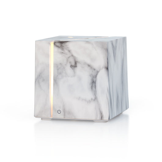 White and grey marble pattern ultrasonic aromatherapy diffuser with a vertical gold LED light strip and power button. - Image 7