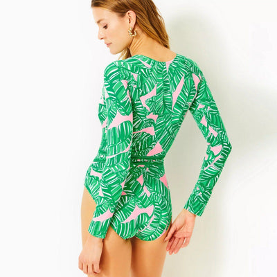 Green and pink tropical leaf print maxi skirt with tiered ruffles and an elastic waistband. - Image 3