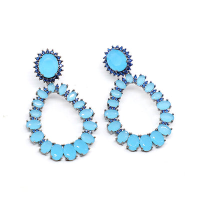 Aretes de Cristal Ovalados con Incrustaciones de Circonio y Diamante - Image 8