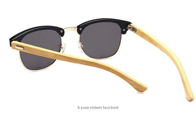 Clubmaster sunglasses with black upper frames, gold-tone metal lower rims, blue mirrored lenses, and light wood-look temples. - Image 18