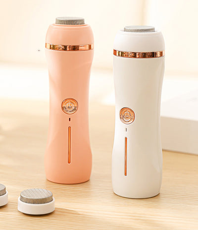 Orange pink portable electric foot grinder with a matte finish and rose gold accents, featuring a power button and grinding head. - Image 16