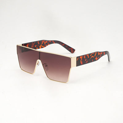 Oversized square sunglasses with a gold metal frame, dark gray lenses, and black plastic temples. - Image 8