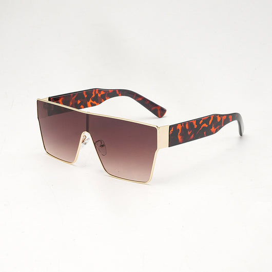 Oversized square sunglasses with a gold metal frame, dark gray lenses, and black plastic temples. - Image 8