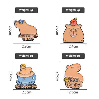 Cute capybara enamel brooch wearing a pink donut with sprinkles and "DONUT WORRY BE CAPPY" text. - Image 35