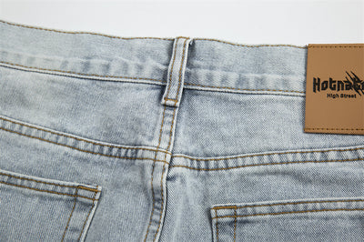 Jeans Holgados Retro con Rotos y Parches para Hombre - Image 17