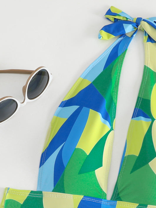 Sexy lace-up backless beach swimwear skirt set with a vibrant blue, green, and yellow geometric print. - Image 9