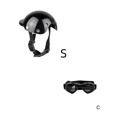Black pet helmet with an adjustable chin strap and a pair of black pet goggles with an elastic strap. - Image 7