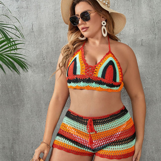 Woman in a blue and white striped crochet two-piece swimsuit with a halter top and high-waisted shorts. - Image 11