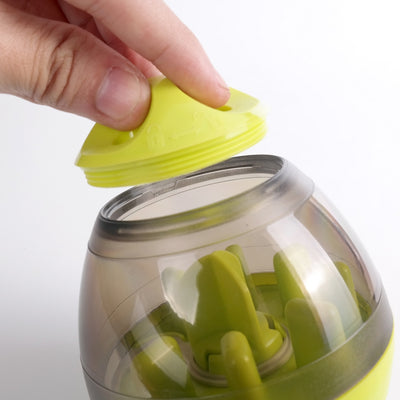 Lime green and transparent egg-shaped pet food dispenser toy, 100mm wide and 117mm tall, for slow feeding. - Image 6