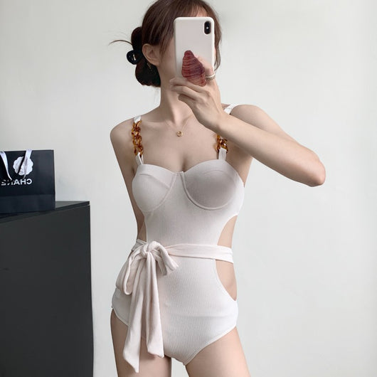 Black ribbed one-piece swimsuit with sweetheart neckline, chain-link shoulder strap, side cut-outs, and self-tie waist. - Image 7