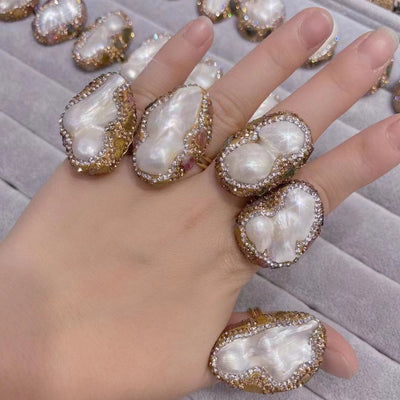 Baroque pearl necklace, ring, earrings, and bracelet set with gold-toned settings and sparkling accents. - Image 3