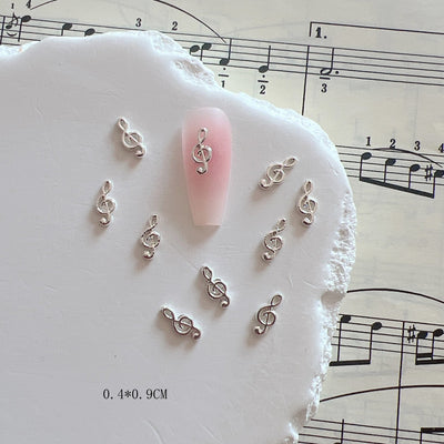 Accesorios de Uñas Metálicos con Símbolos Musicales - Image 6
