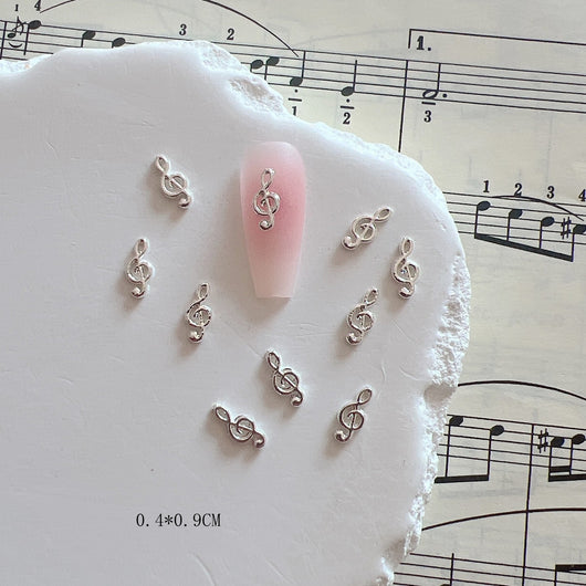 Accesorios de Uñas Metálicos con Símbolos Musicales - Image 6