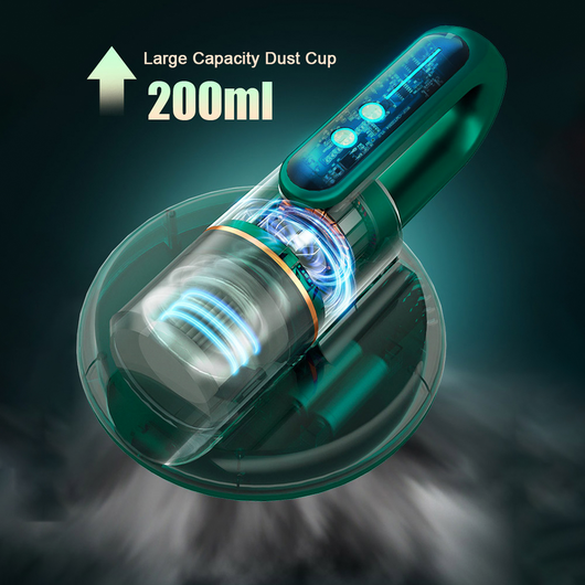 Dark blue handheld bed vacuum cleaner with clear dustbin, gold accents, and illuminated control panel on a charging base. - Image 12