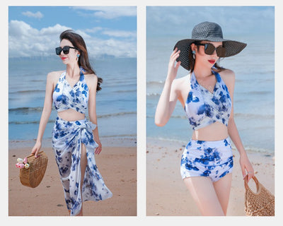 Women's light blue tropical leaf print three-piece swimsuit with short sleeve bikini top, bottoms, and sarong skirt. - Image 39