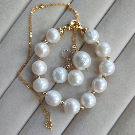 Conjunto de Tres Piezas en Oro de 14K: Aretes, Collar y Pulsera - Image 2