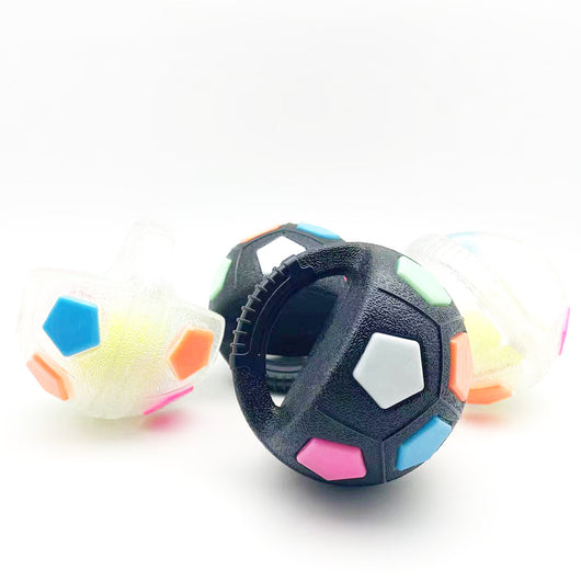 Black and white soccer ball dog toy with a textured handle, designed for interactive play and self-amusement. - Image 20