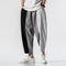 Calça Harem Masculina com Listras de Contraste Tendência Japonesa
