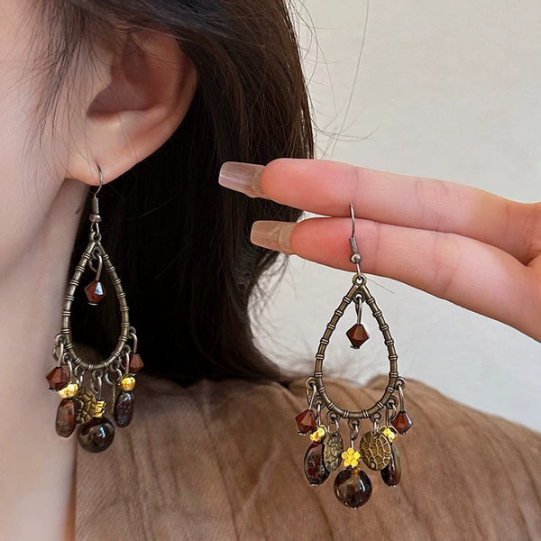 Aretes Retro Chinos de Gotas Huecas - Diseño Elegante