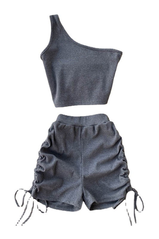 Conjunto Infantil Camiseta Asimétrica con Shorts Talle Alto Plisados