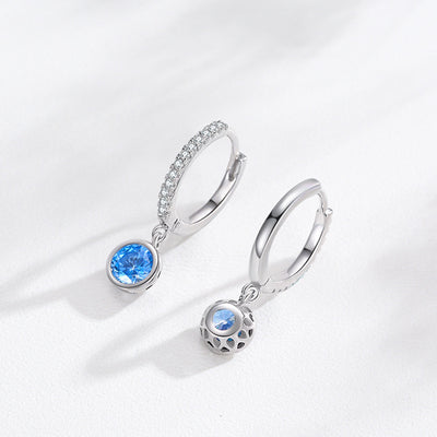 Women's light luxury jewelry set with a silver-toned necklace and hoop earrings, each featuring a sea blue artificial diamond pendant and clear artificial diamo - Image 4
