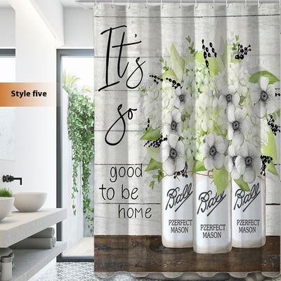 White shower curtain with a vibrant green botanical leaf print, hanging in a bright, modern bathroom. - Image 6