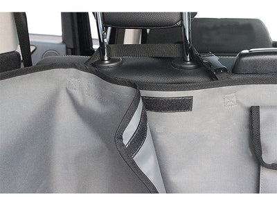 Black waterproof 600D Oxford cloth pet mat covering a vehicle's cargo area, featuring side flaps and a storage pocket. - Image 9