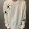 Suéter Unisex con Patrón de Araña en Jacquard