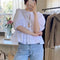 Blusa Femenina Cuello Redondo con Lazo y Mangas Globo