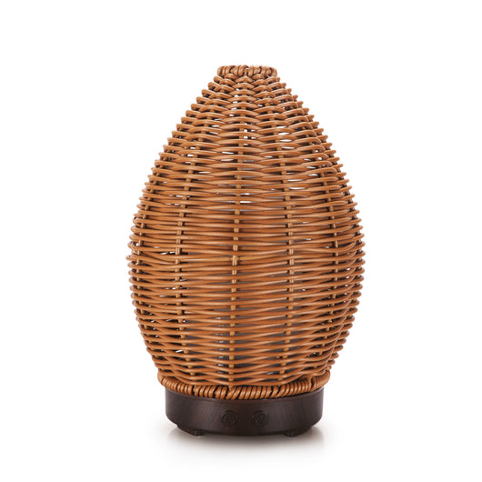 Hollow rattan aroma diffuser with an egg-shaped woven brown exterior and a light wood-grain base. - Image 8