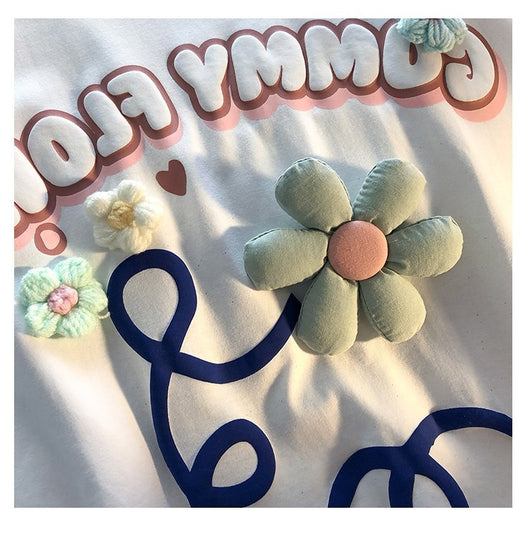 Playera Estampada con Letras Florales y Espuma - Image 11