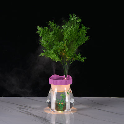 Creative desktop humidifier with artificial red roses, clear base, pink top, and color-changing LED light mist. - Image 13