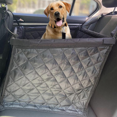Golden retriever in a dark grey quilted pet car seat, secured in the back seat of a car. - Image 7