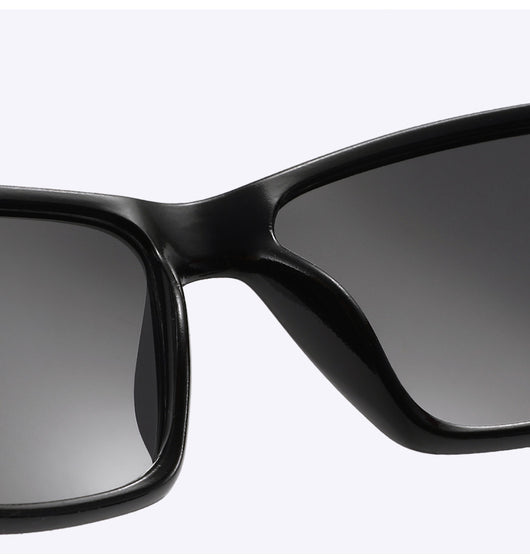 Black and blue polarized sports sunglasses with rectangular frames and blue mirrored lenses reflecting snowy mountains. - Image 15