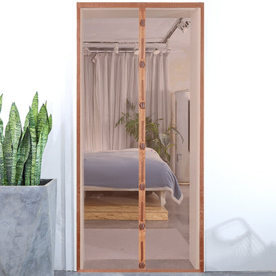 Black magnetic mosquito-proof curtain installed in a white doorway, with a puppy sitting in front of it. - Image 7