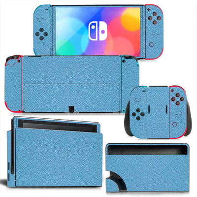 Yellow textured vinyl skin set for Nintendo Switch OLED console, Joy-Cons, and dock, shown disassembled. - Image 10