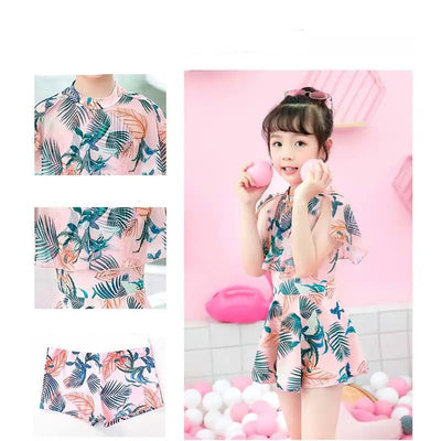 Mother and daughter matching swimsuits with blue and pink tropical leaf print. Adult halter top and skirt, child's ruffle top and skirt. - Image 4