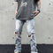Jeans Rectos con Rotos y Cintura Ajustada