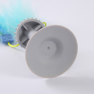 Gray suction cup cat toy with a textured top and two blue and yellow feathered wands attached by green cords. - Image 2