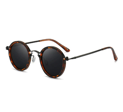 Women's retro round frame polarized sunglasses with gold metal frames, brown lenses, and orange temple tips. - Image 7