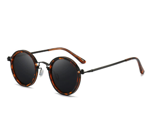 Women's retro round frame polarized sunglasses with gold metal frames, brown lenses, and orange temple tips. - Image 7