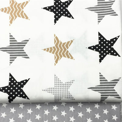 Tela de Algodón con Estrellas de Cinco Puntas y Lunares - Gris y Negro