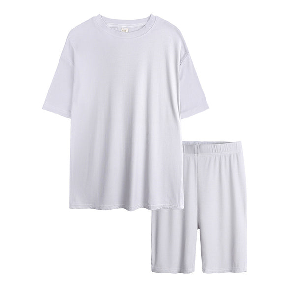 Light pink ribbed knit short-sleeved t-shirt and biker shorts two-piece loungewear set for women. - Image 11